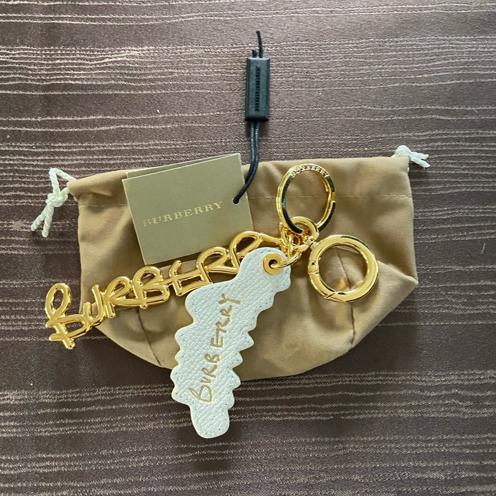 Brand New $285 Burberry leather gold white keychain key fob for purse bag